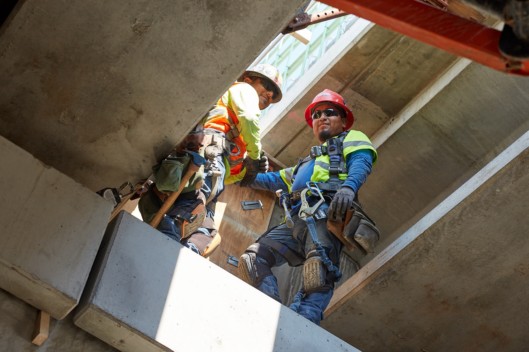 Construction workers on concrete structure site