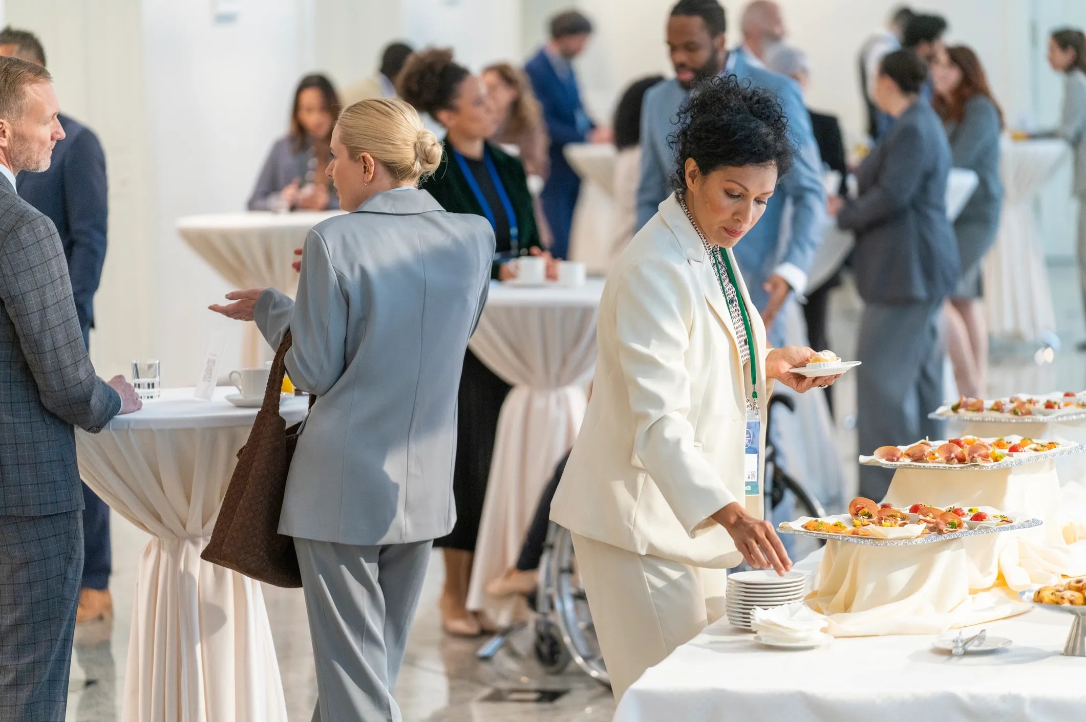 Business professionals networking at catered event